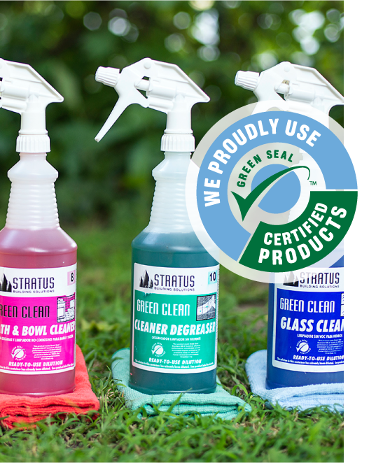 Three Bottles of Stratus Cleaning Products with a "We Proudly Use Green Seal Certified Products” Logo Overlaid on the Image